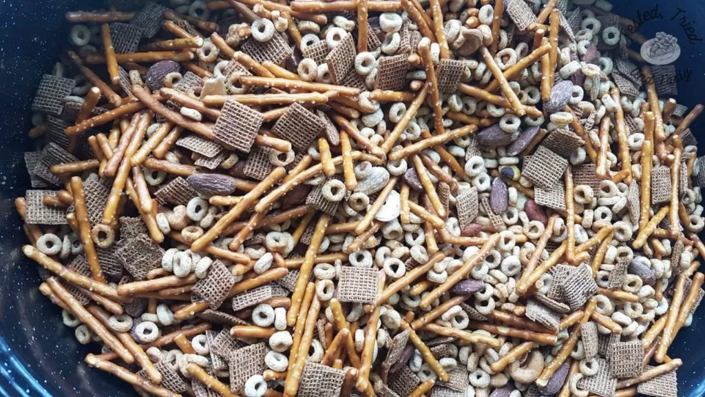 Homemade Nuts and Bolts recipe in a large roaster.