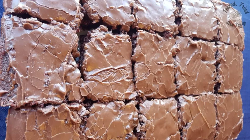 Fudgy Texas Brownies cut up into squares.