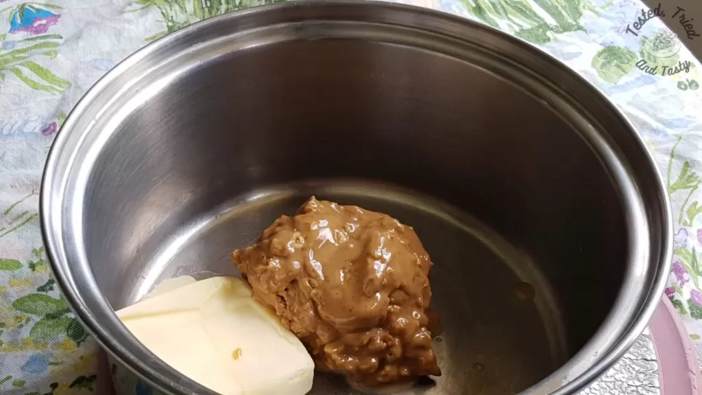Butter and peanut butter in a medium saucepan.