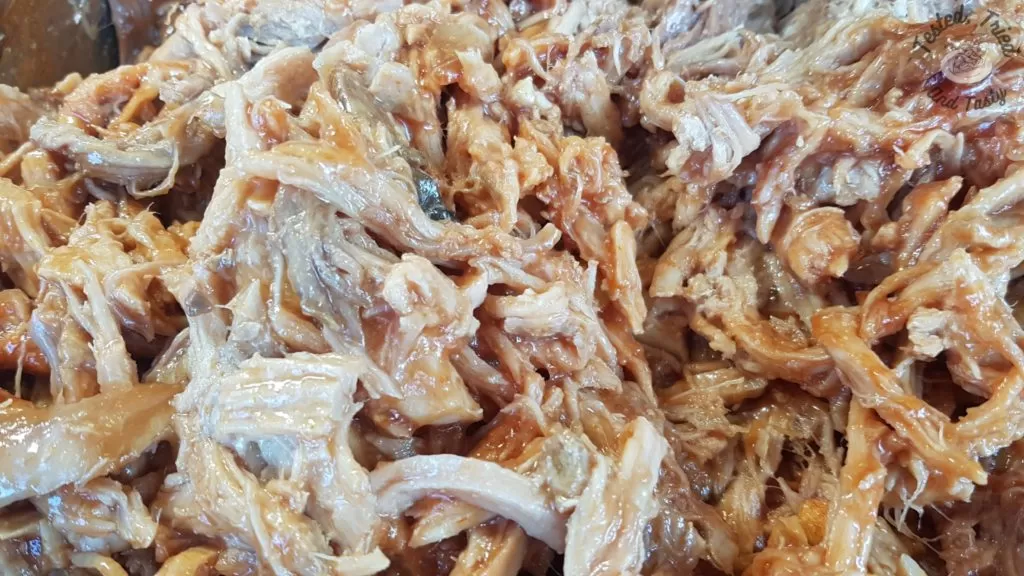 Homemade Sweet and Smokey BBQ sauce on pulled pork.