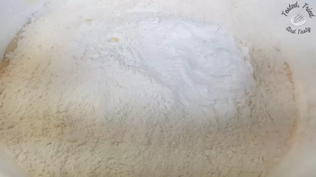 Dry ingredients added to the creamed butter mixture.