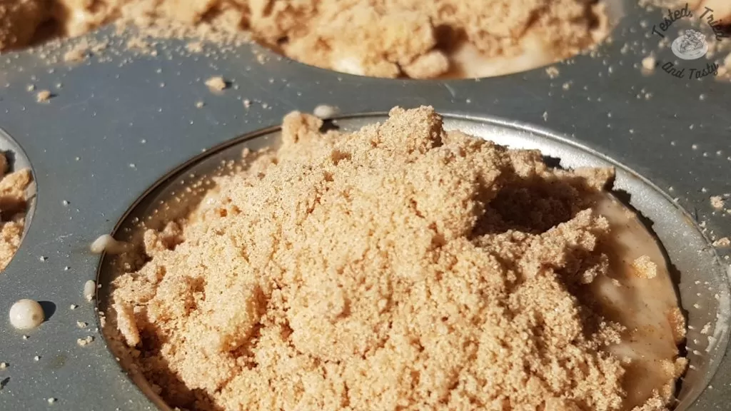 Close up of apple streusel muffin ready to bake.