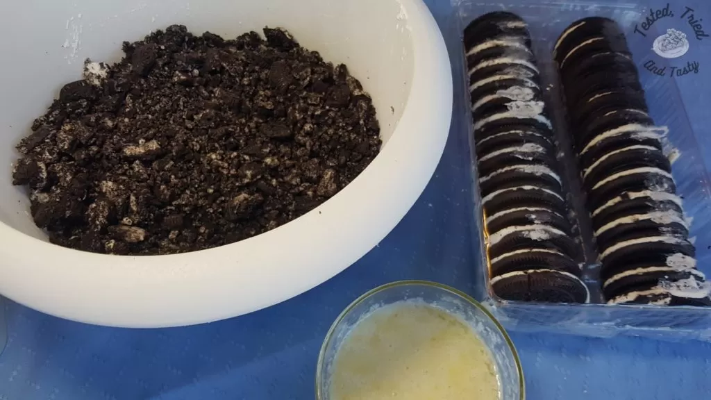 Oreo cookies and crumbs with melted butter.
