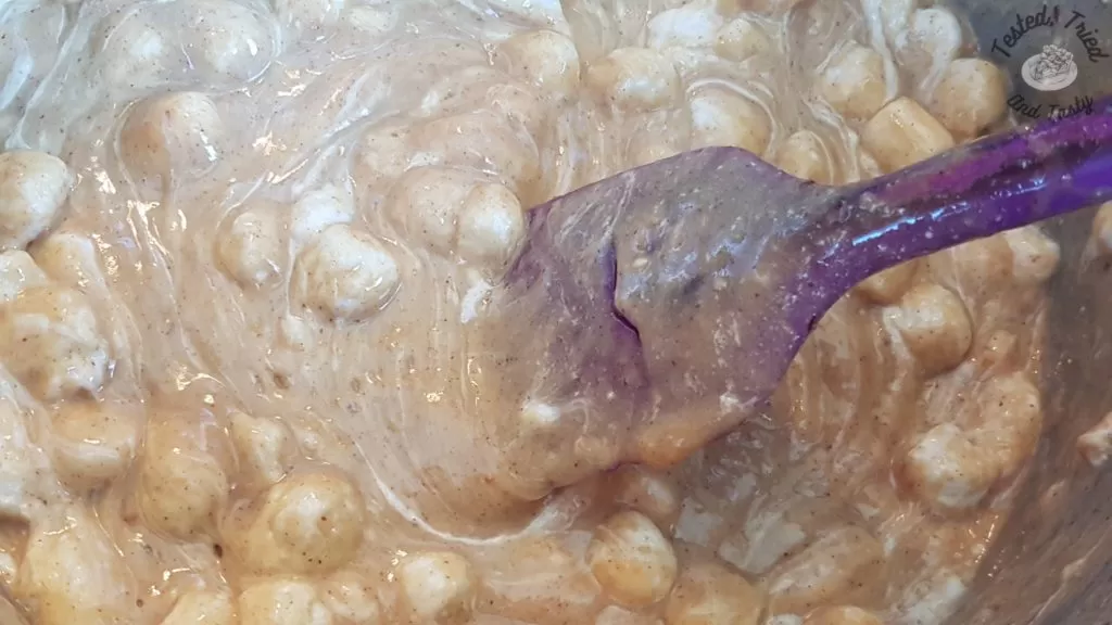 Peanut butter, butter and marshmallows being melted.