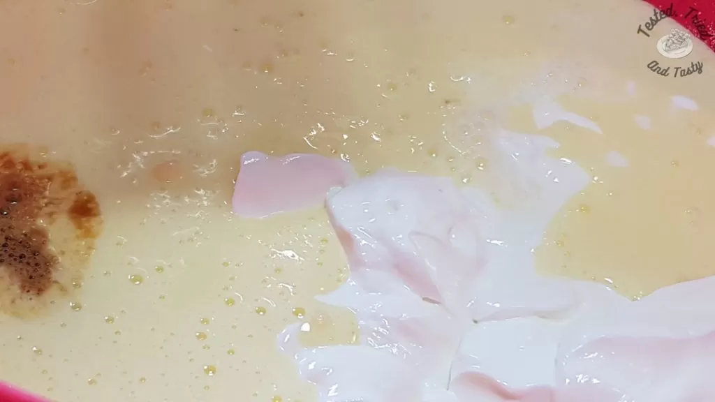 Sour cream, buttermilk, vanilla and eggs ready to be mixed.
