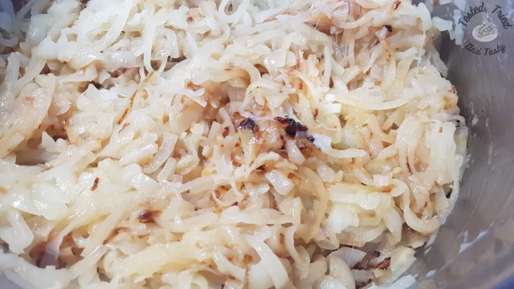 Caramellized onions in a large saucepan.