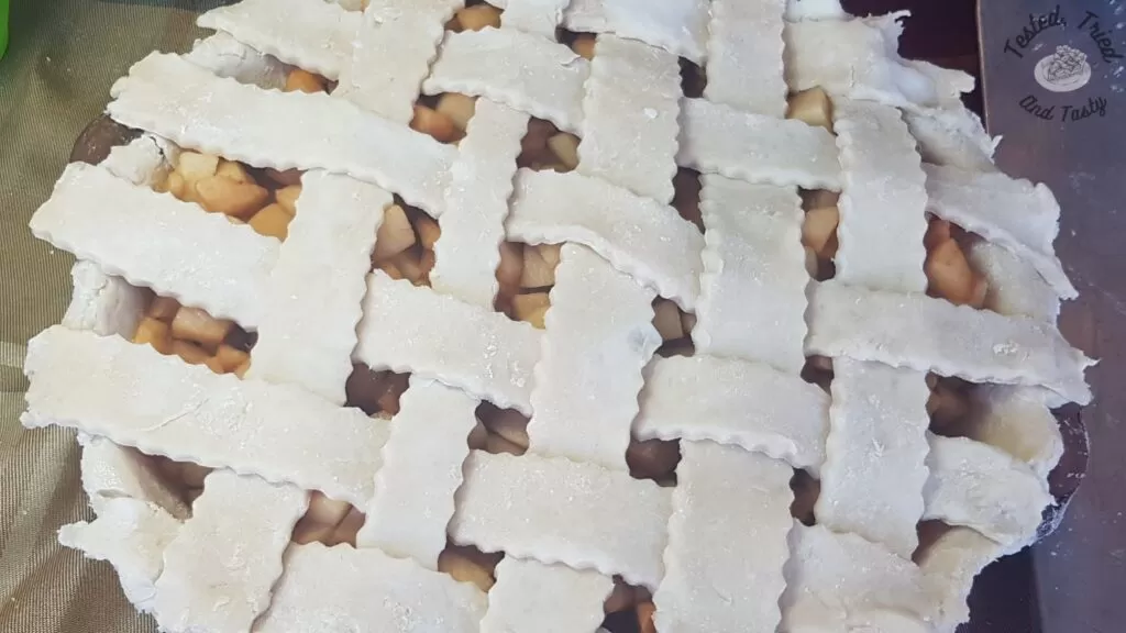 Lattice crust on caramel apple pie.