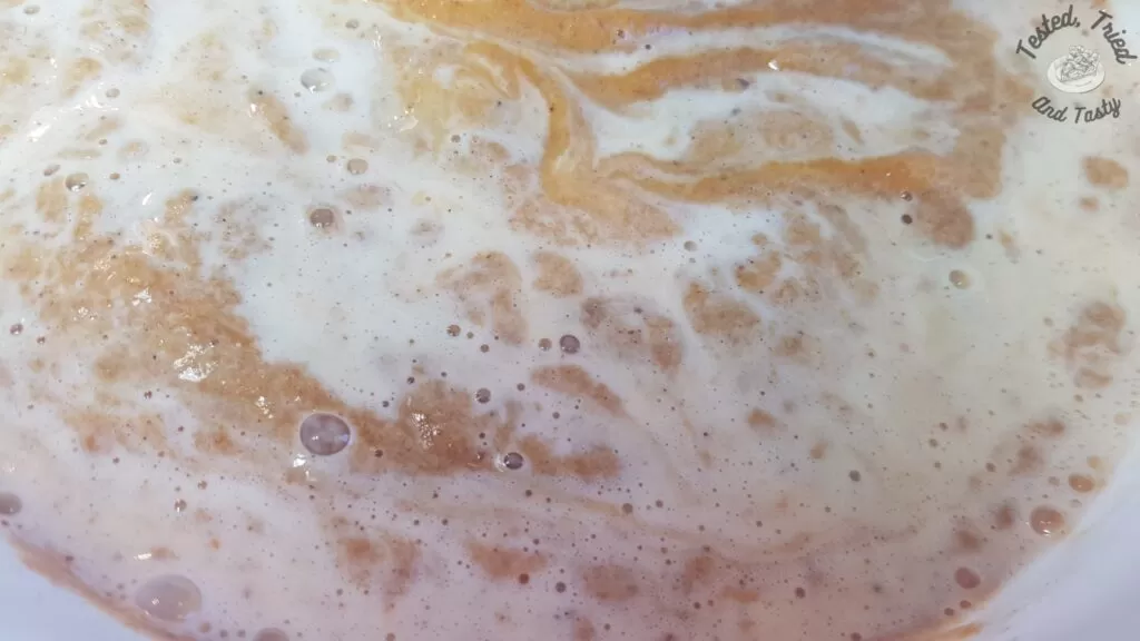 Evaporated milk added to pumpkin pie filling mixture for pumpkin dessert.