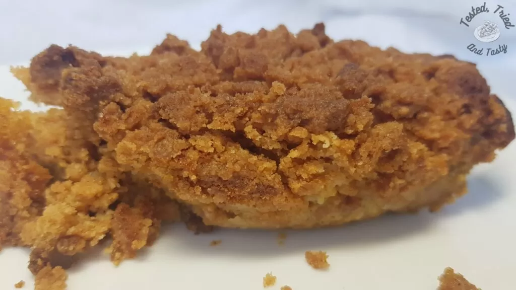 Pumpkin dump cake on a white plate.