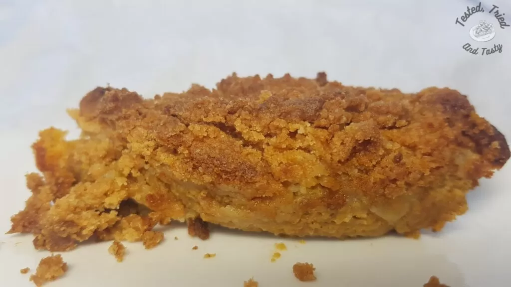 Pumpkin dump cake on a white plate.