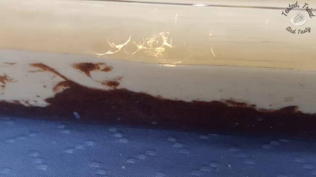 The two layers of black forest cheesecake cake.