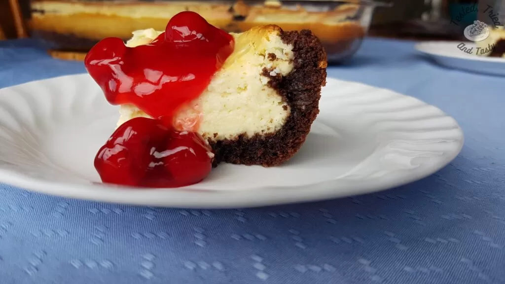 Black Forest Cheesecake Cake with cherry pie filling.