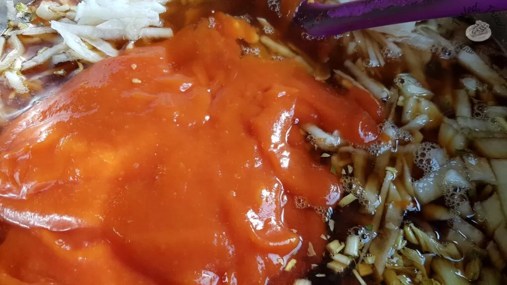 Water, beef bouillon, canned tomatoes, tomato soup, carrots, potatoes, onion, celery in a large saucepan.