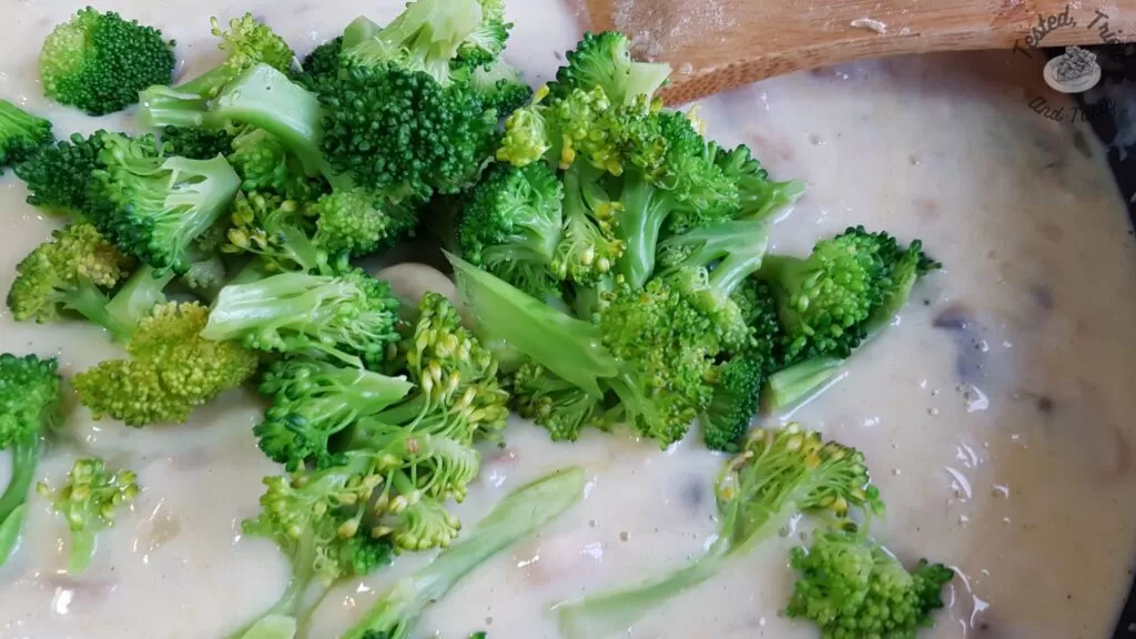 Broccoli added to the roux for broccoli quiche.