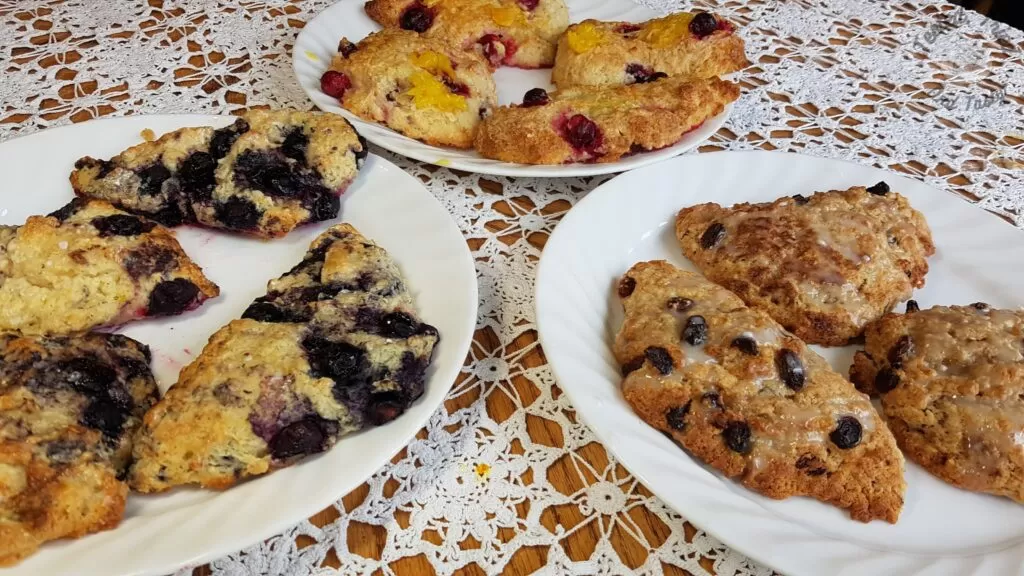 Scones recipe with glaze on white plates.