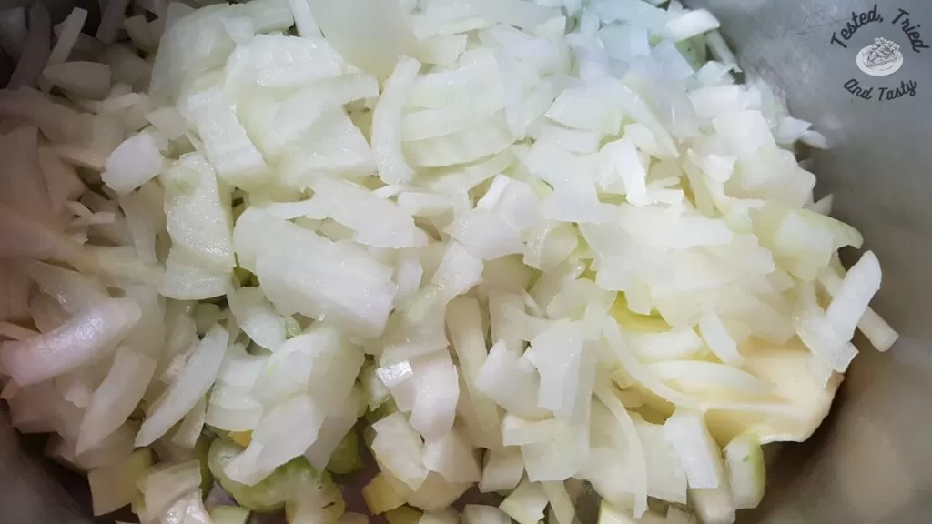 Onions and celery in the pan.