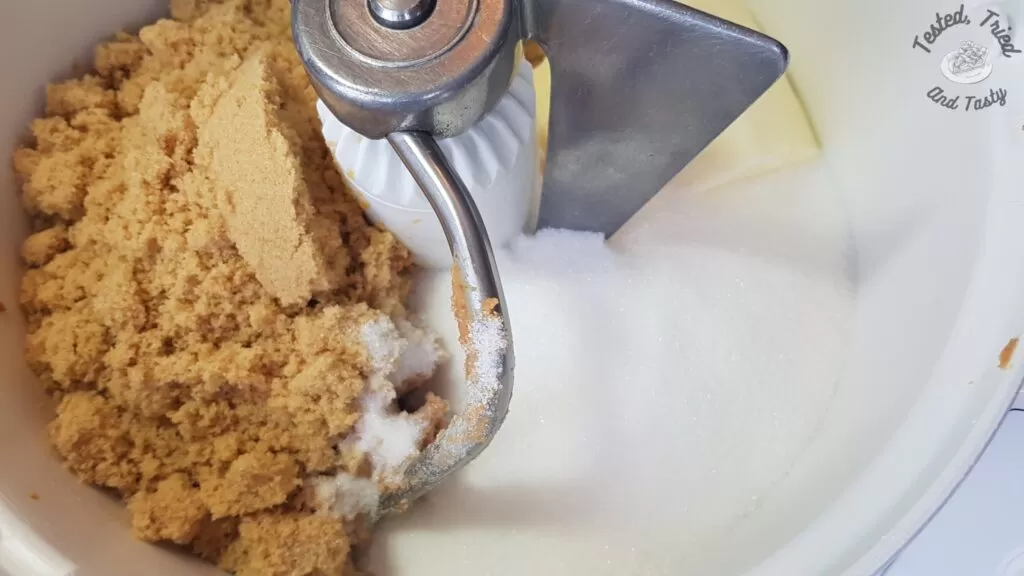 Butter brown sugar and white sugar in a bosch mixer.