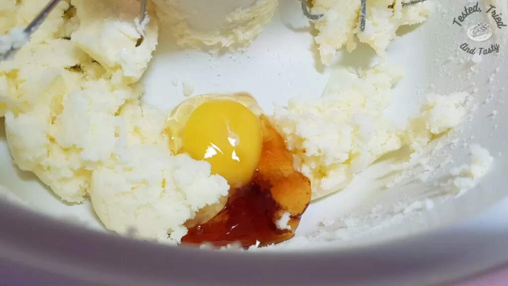 Egg and corn syrup added to the butter sugar mixture.