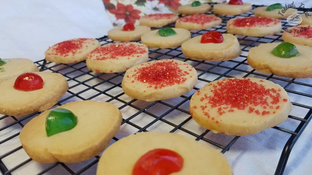 Shortbread cookies on a wire cooling rack.
