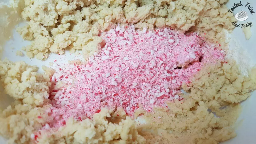 Crushed candy canes added to cookie dough.