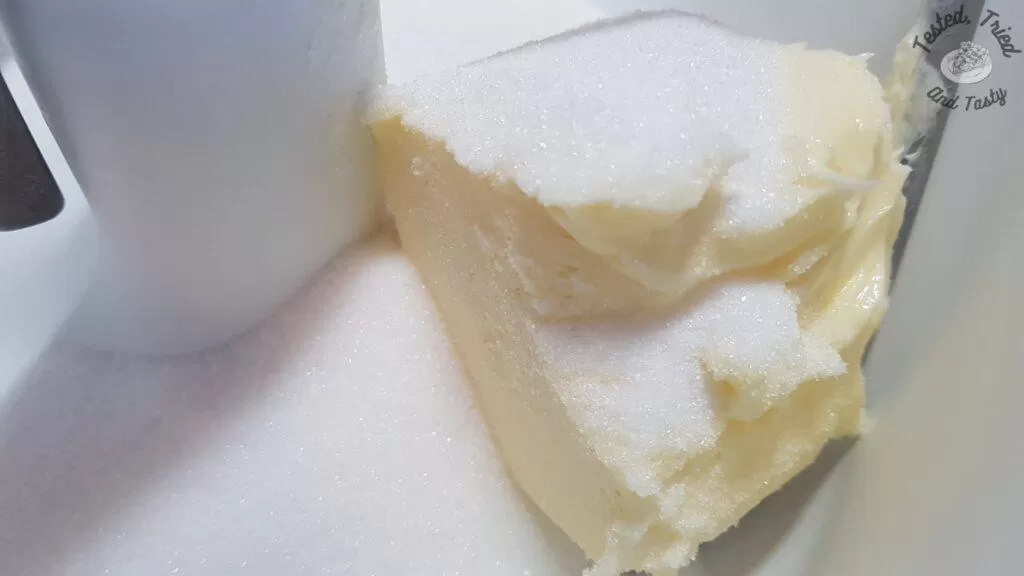 Butter and sugar to be creamed for cookies.