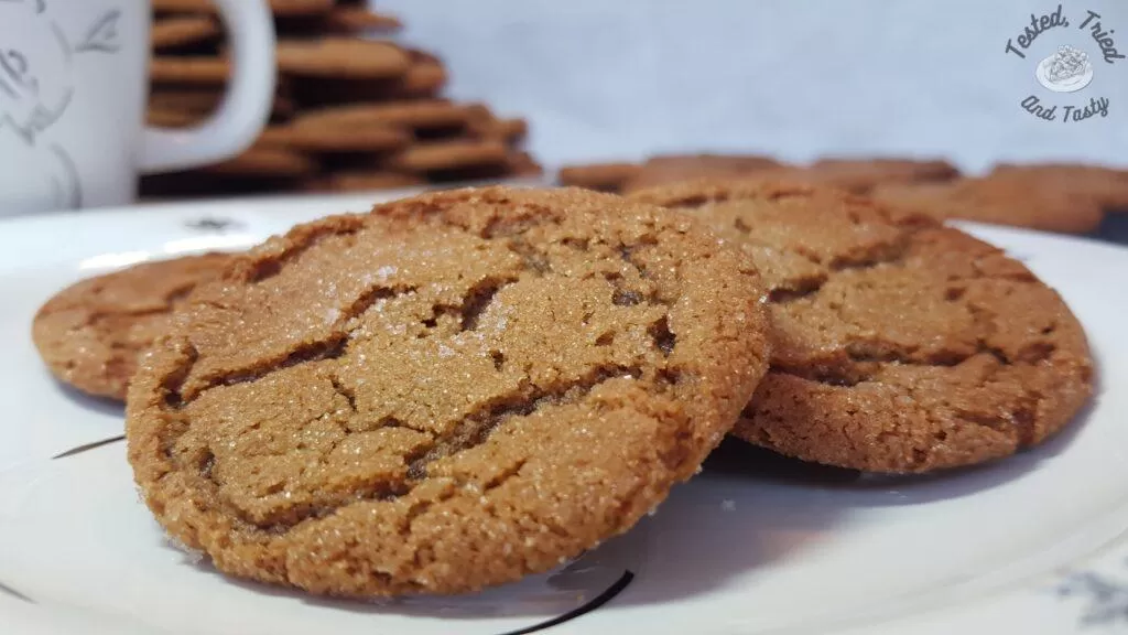 Gingersnap cookies on a christmas plate.
