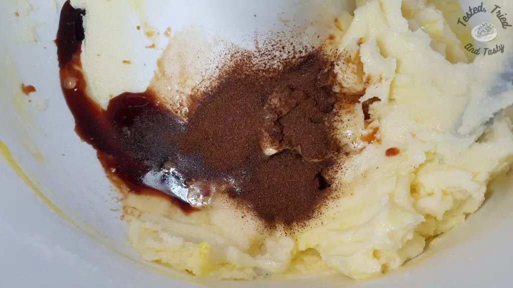 Vanilla and nutmeg added to creamed butter and sugar.