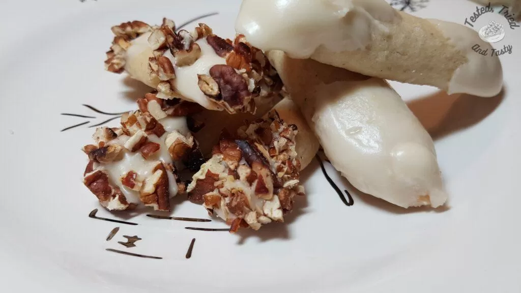 Eggnog log cookies with a glass of eggnog.
