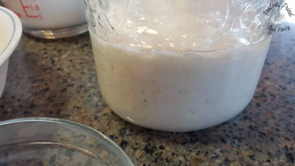 Sourdough starter in a large jar.