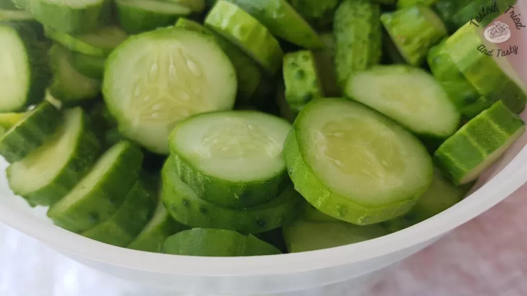 Sliced garden cucumbers ready to make sweet refrigerator pickles.