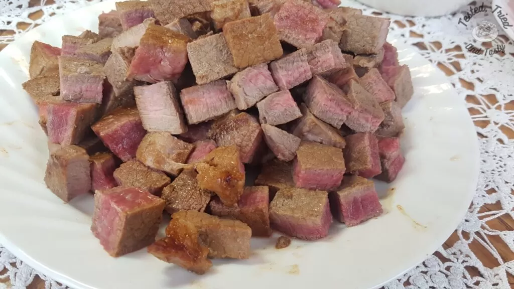 Beef browned and cut into bite sized pieces for the slow cooker beef stew.