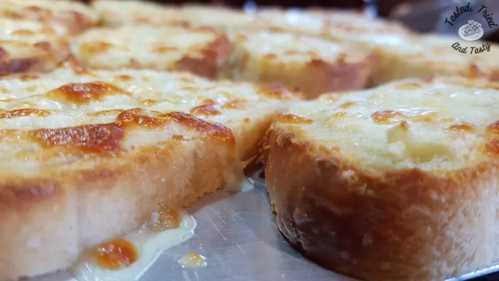 Close up of garlic cheese bread.