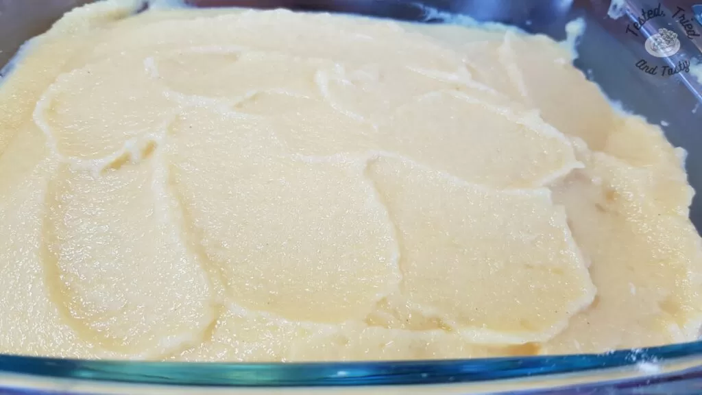 The creamy mashed rutabaga in a glass casserole dish.