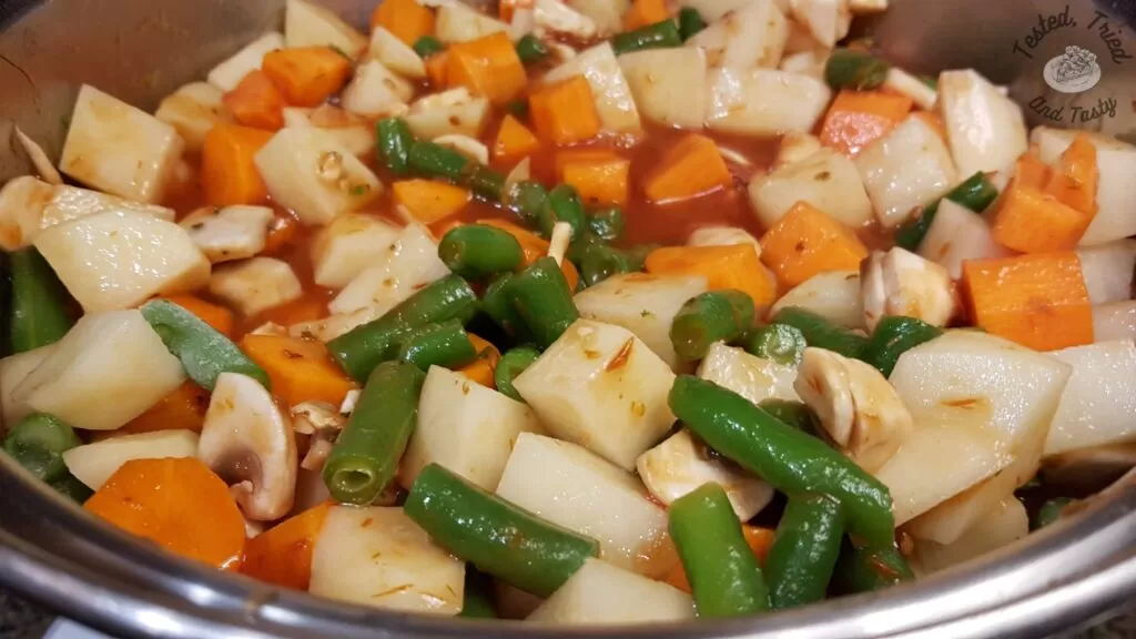 All other ingredients added to saucepan for stovetop hamburger stew.