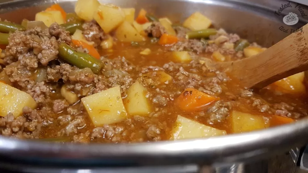 Stovetop hamburger stew finished cooking.