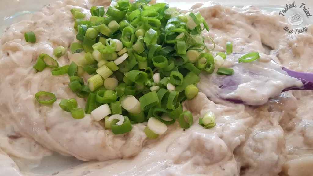 Gravy soup and green onions.