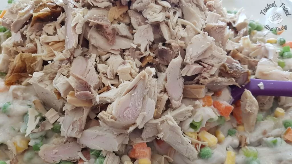 Turkey added to the gravy mixture for leftover turkey casserole.